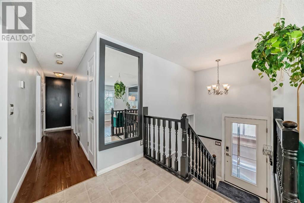 Single Family House Bi-level for Sale in  Shawcliffe Circle SW Shawnessy Calgary 