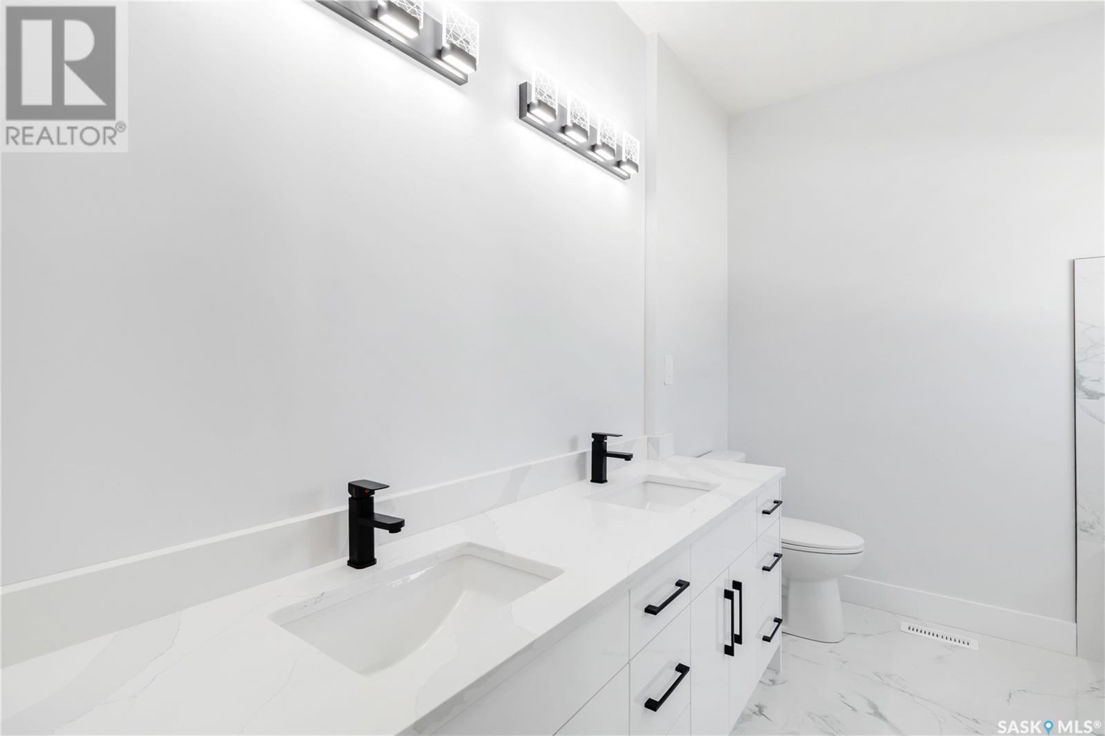 Photo 24 of 840 Ballesteros Crescent, Warman SK