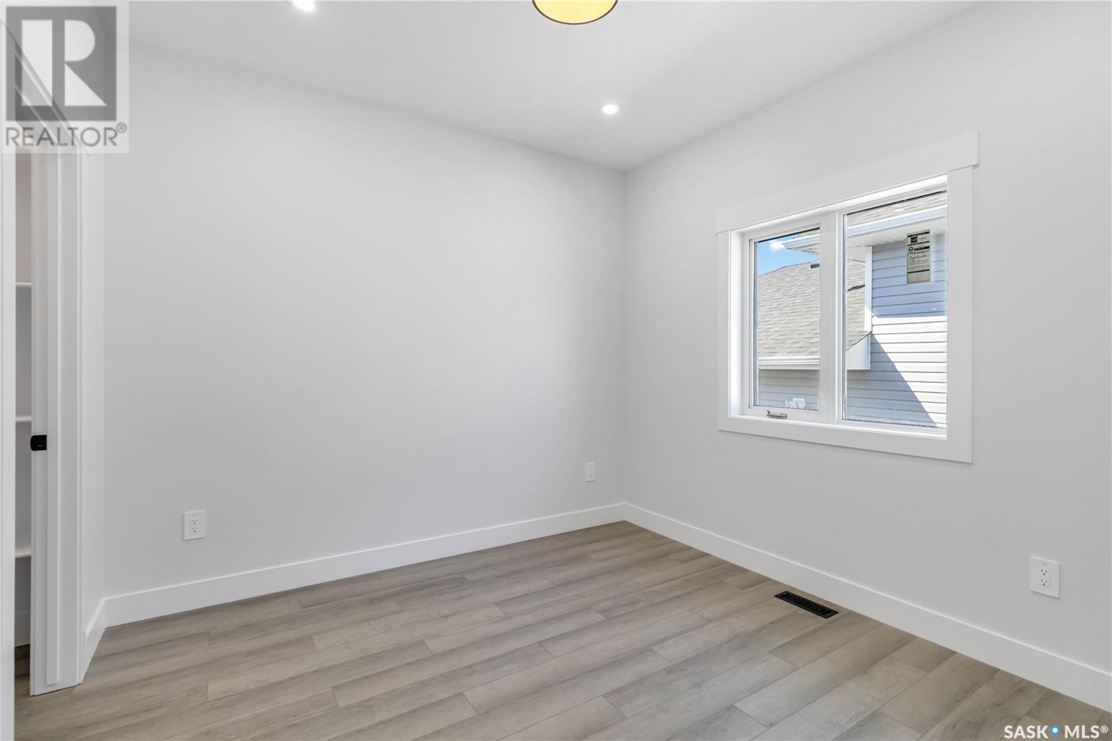 Photo 18 of 840 Ballesteros Crescent, Warman SK