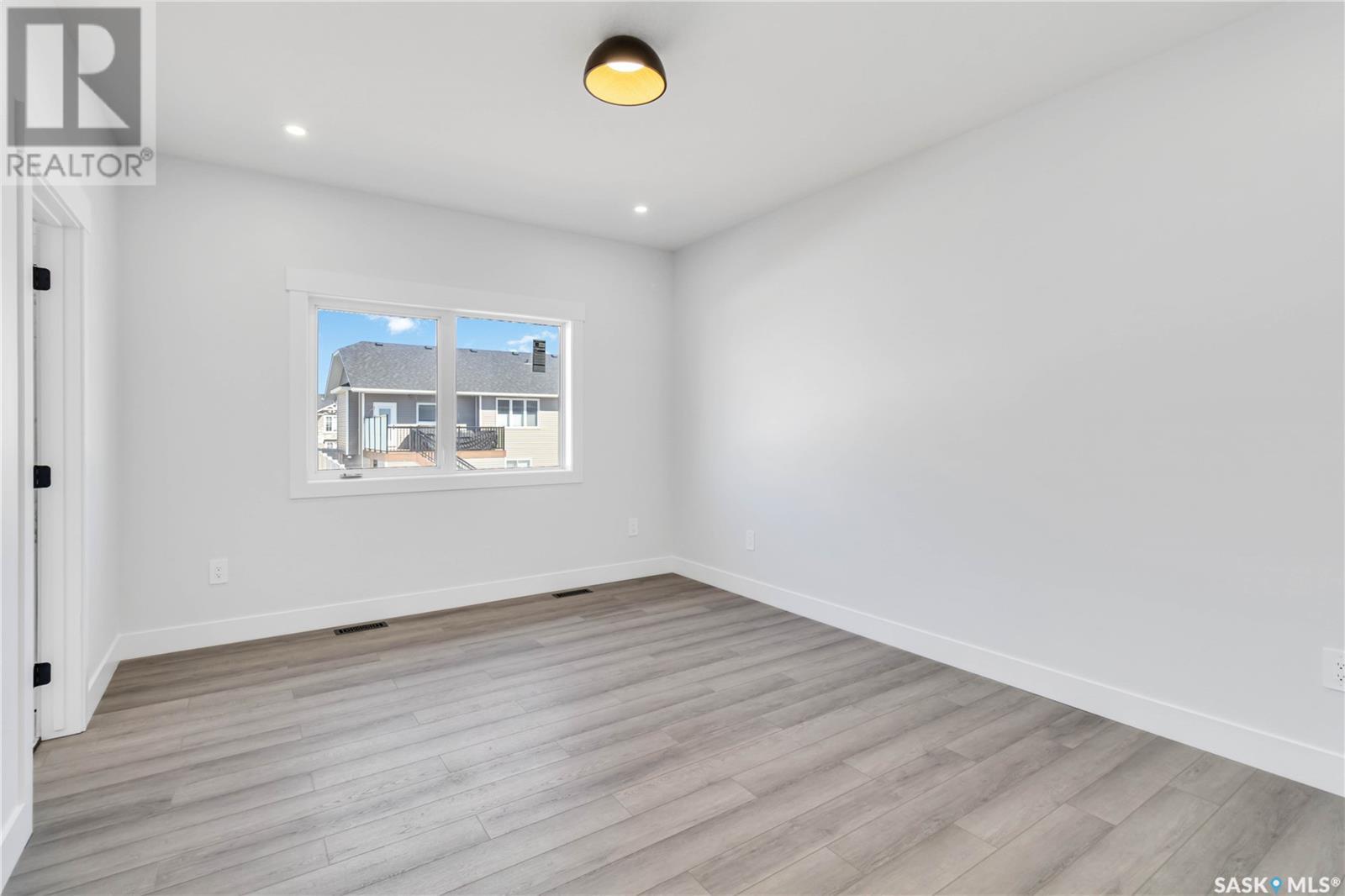 Photo 22 of 840 Ballesteros Crescent, Warman SK