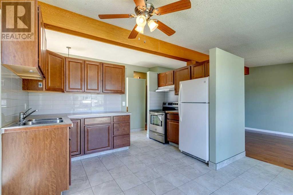 Single Family House Bi-level for Sale in  Canfield Way SW Canyon Meadows Calgary 