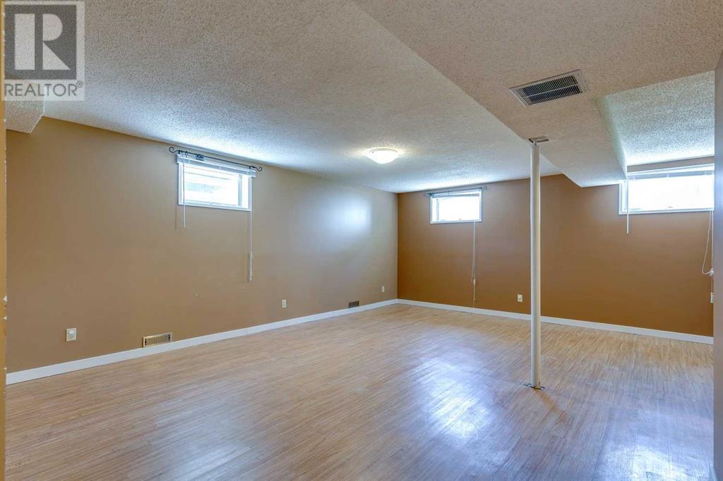 Single Family House Bi-level for Sale in  Canfield Way SW Canyon Meadows Calgary 