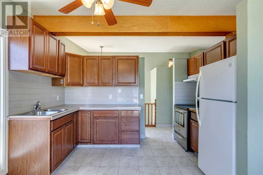 Single Family House Bi-level for Sale in  Canfield Way SW Canyon Meadows Calgary 