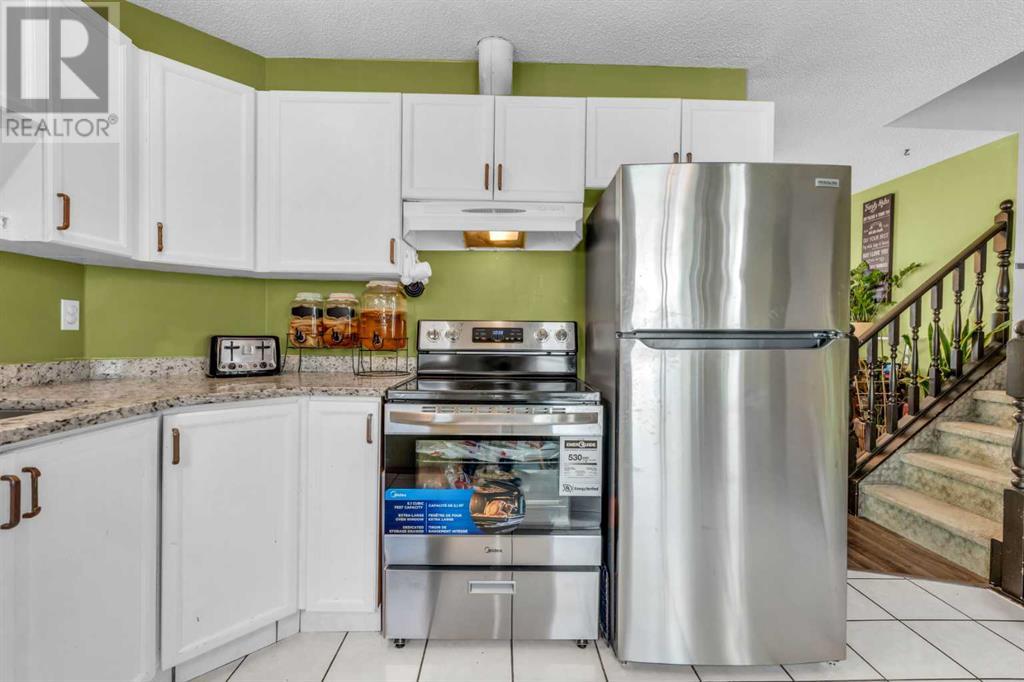Single Family House 4 Level for Sale in  Erin Green Mews SE Erin Woods Calgary 