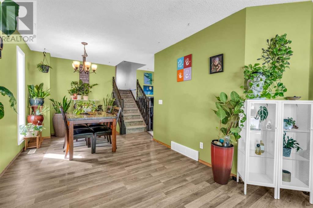 Single Family House 4 Level for Sale in  Erin Green Mews SE Erin Woods Calgary 