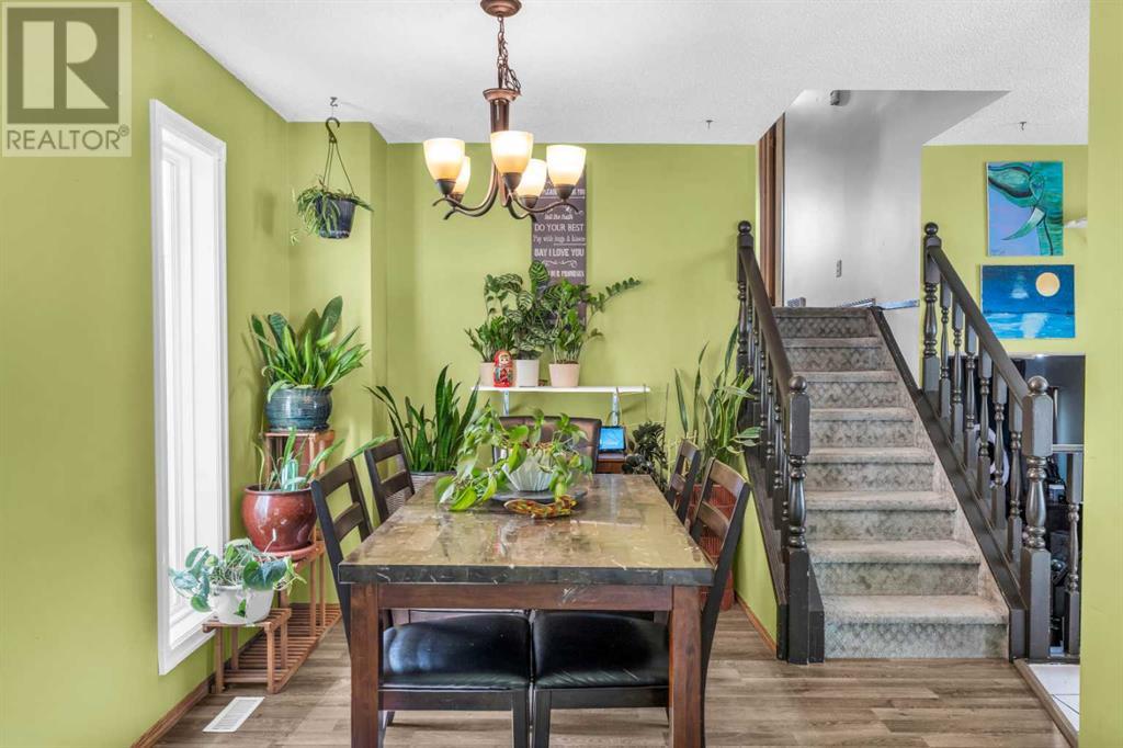 Single Family House 4 Level for Sale in  Erin Green Mews SE Erin Woods Calgary 