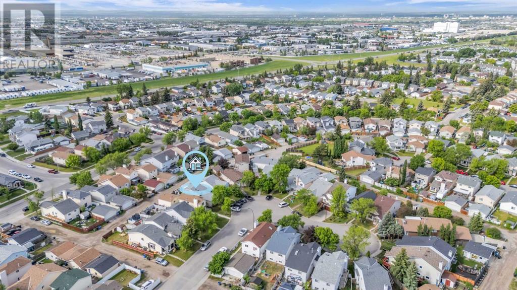 Single Family House 4 Level for Sale in  Erin Green Mews SE Erin Woods Calgary 