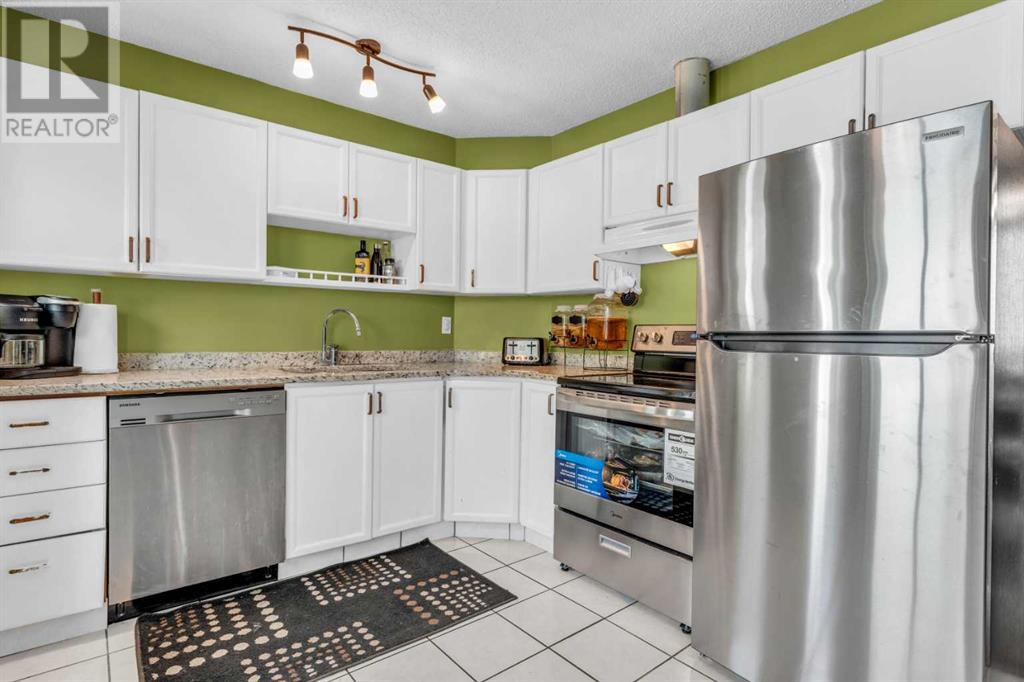 Single Family House 4 Level for Sale in  Erin Green Mews SE Erin Woods Calgary 