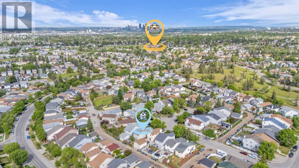 Single Family House 4 Level for Sale in  Erin Green Mews SE Erin Woods Calgary 