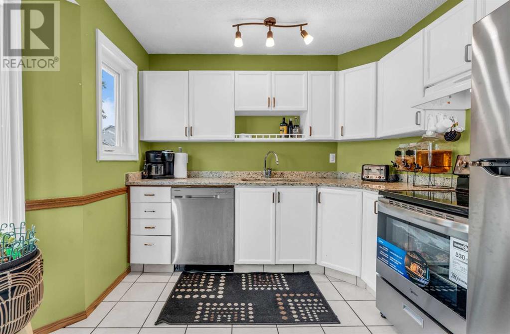 Single Family House 4 Level for Sale in  Erin Green Mews SE Erin Woods Calgary 
