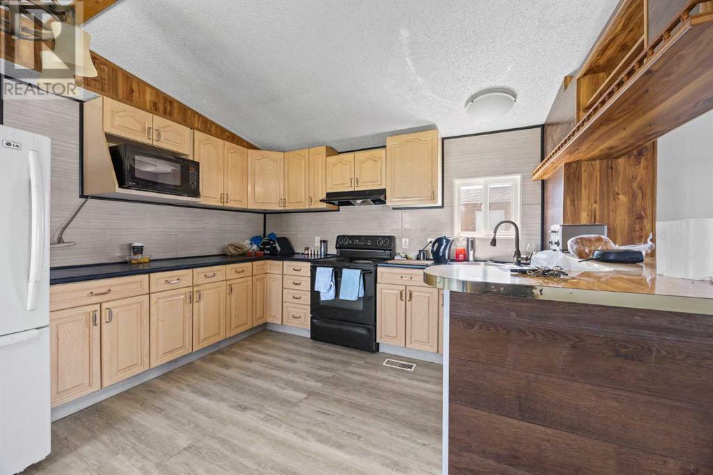 Single Family House Mobile Home for Sale in    Avenue SE Red Carpet Calgary 