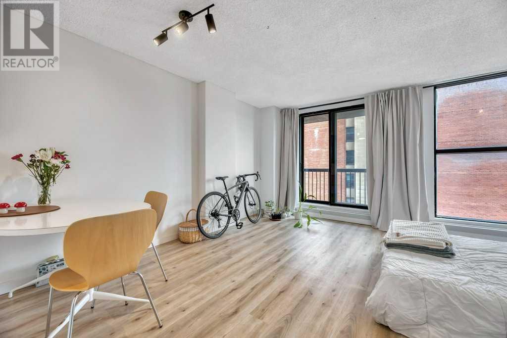 Single Family House Loft for Sale in    Avenue SW Chinatown Calgary 