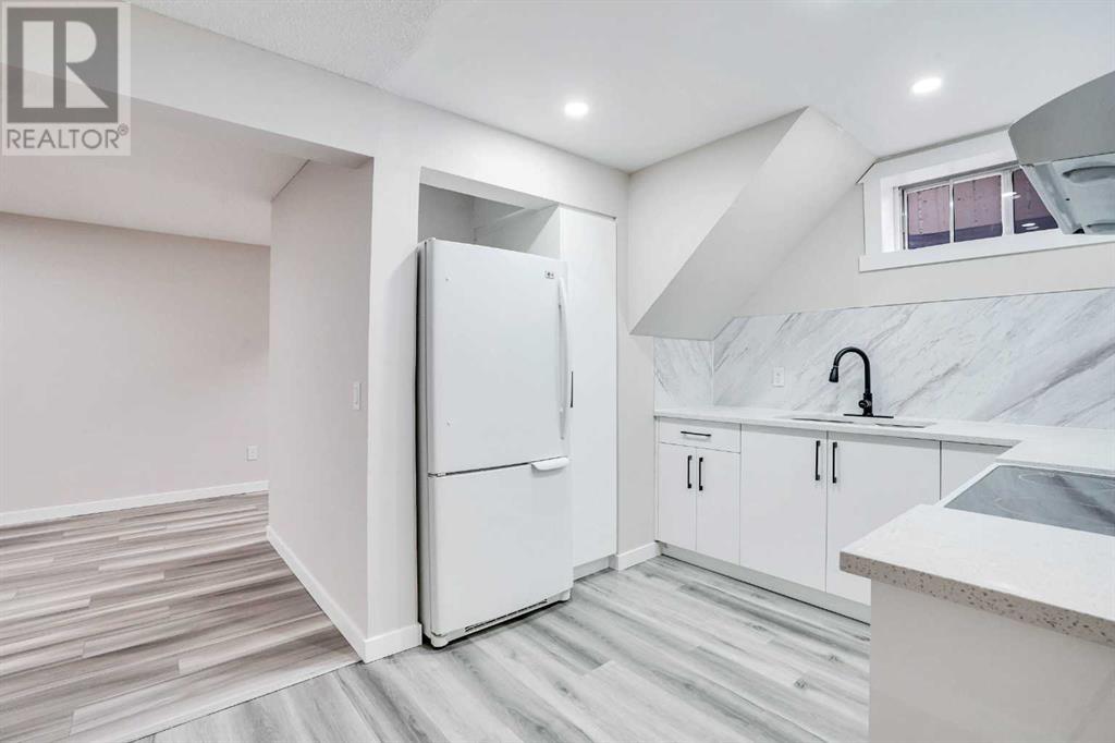 Single Family House for Sale in  Del Monica Place NE Monterey Park Calgary 