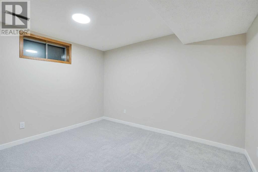 Single Family House for Sale in  Del Monica Place NE Monterey Park Calgary 