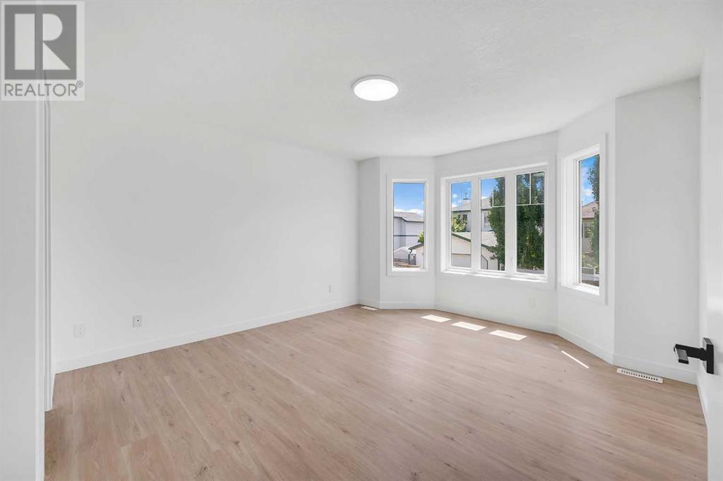 Single Family House Bi-level for Sale in  Los Alamos Place NE Monterey Park Calgary 