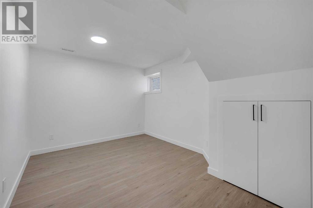 Single Family House Bi-level for Sale in  Los Alamos Place NE Monterey Park Calgary 