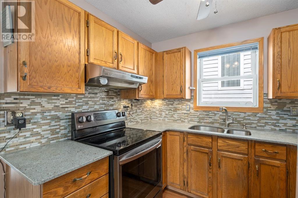 Single Family House Bi-level for Sale in  Erin Woods Drive SE Erin Woods Calgary 