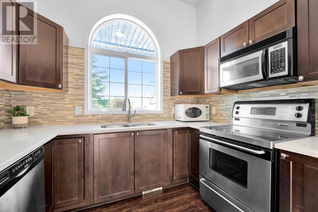Single Family House 4 Level for Sale in  SOMERSIDE Grove SW Somerset Calgary 