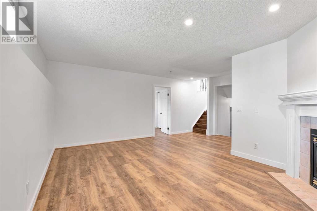 Single Family House 4 Level for Sale in  SOMERSIDE Grove SW Somerset Calgary 