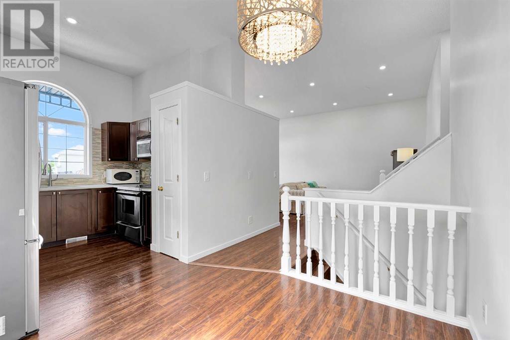Single Family House 4 Level for Sale in  SOMERSIDE Grove SW Somerset Calgary 