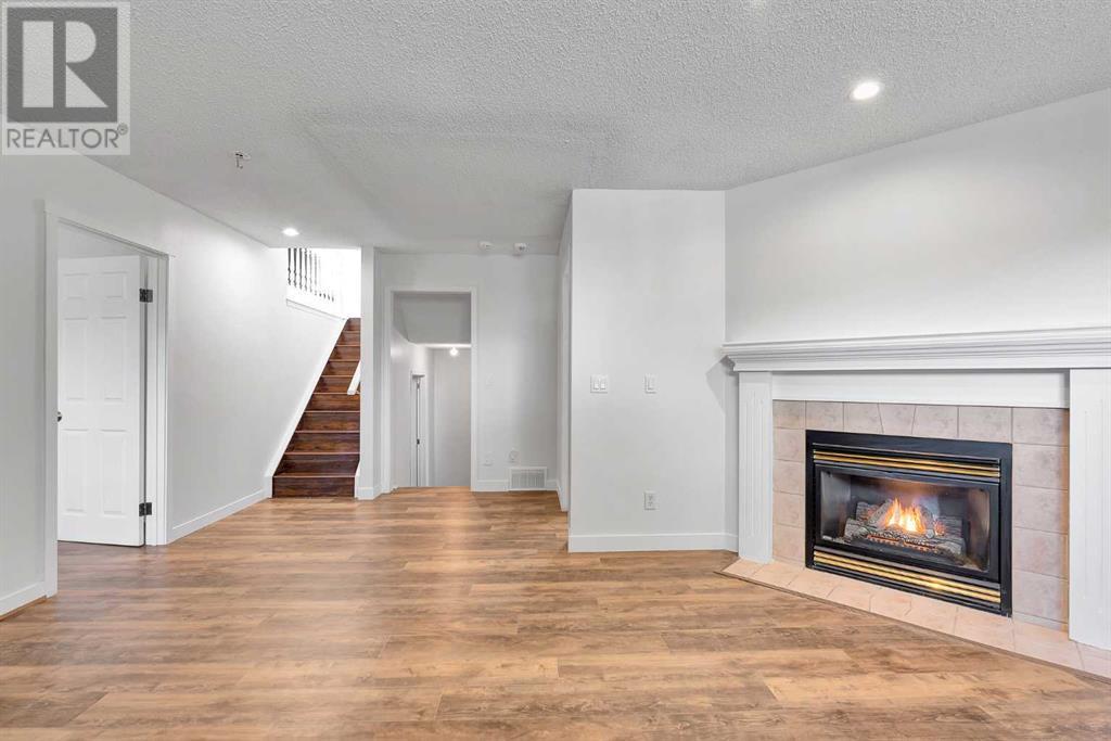 Single Family House 4 Level for Sale in  SOMERSIDE Grove SW Somerset Calgary 
