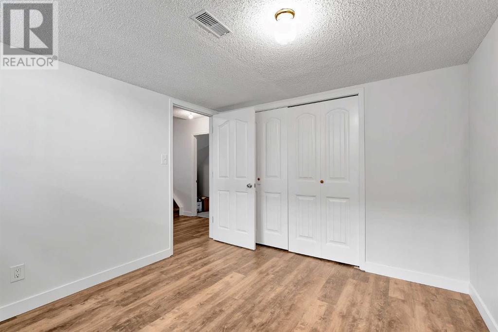 Single Family House 4 Level for Sale in  SOMERSIDE Grove SW Somerset Calgary 