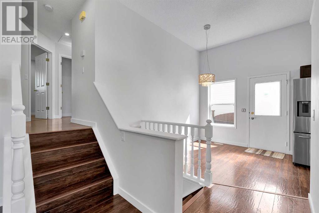 Single Family House 4 Level for Sale in  SOMERSIDE Grove SW Somerset Calgary 