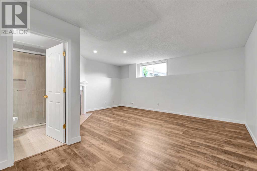 Single Family House 4 Level for Sale in  SOMERSIDE Grove SW Somerset Calgary 