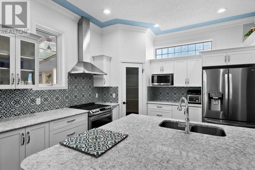 Single Family House Bi-level for Sale in  Rockywood Circle NW Rocky Ridge Calgary 