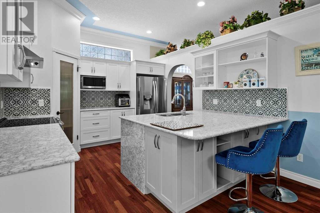 Single Family House Bi-level for Sale in  Rockywood Circle NW Rocky Ridge Calgary 