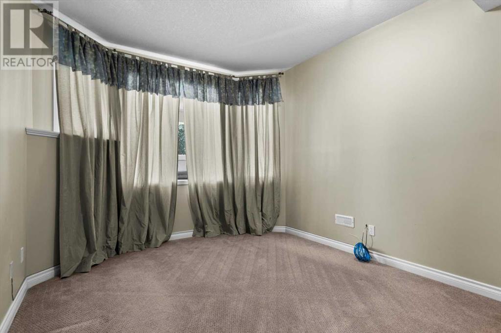 Single Family House Bi-level for Sale in  Rockywood Circle NW Rocky Ridge Calgary 