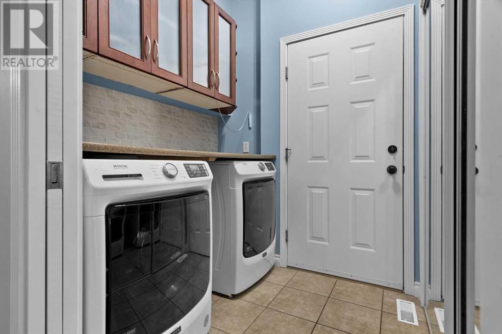 Single Family House Bi-level for Sale in  Rockywood Circle NW Rocky Ridge Calgary 