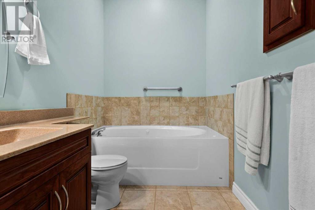 Single Family House Bi-level for Sale in  Rockywood Circle NW Rocky Ridge Calgary 