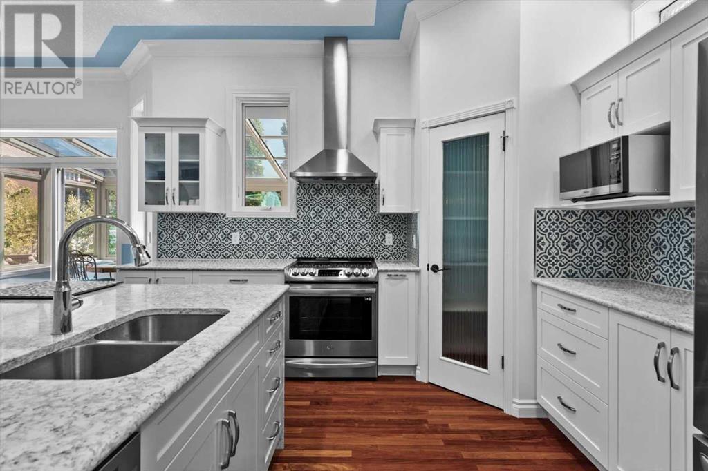 Single Family House Bi-level for Sale in  Rockywood Circle NW Rocky Ridge Calgary 