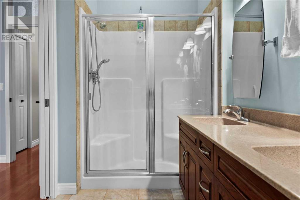 Single Family House Bi-level for Sale in  Rockywood Circle NW Rocky Ridge Calgary 