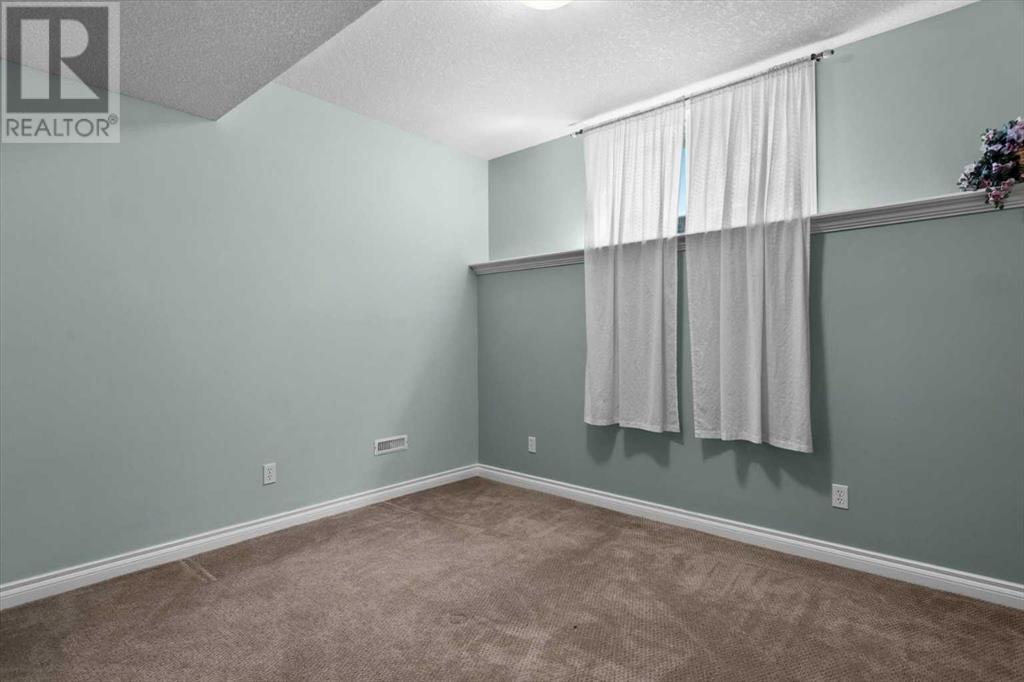 Single Family House Bi-level for Sale in  Rockywood Circle NW Rocky Ridge Calgary 