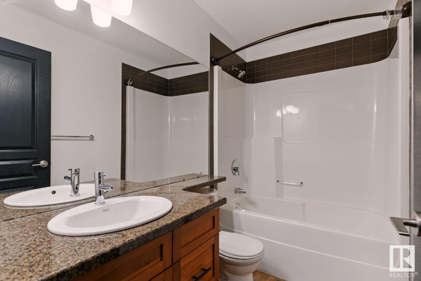 Photo 20 of 8827 180 Av Nw, Edmonton AB