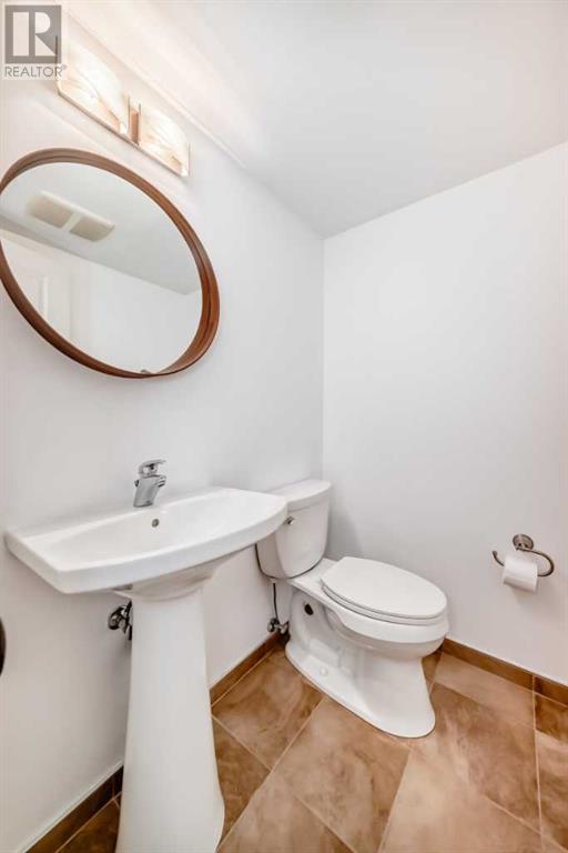 Single Family House 4 Level for Sale in  Cannell Road SW Canyon Meadows Calgary 