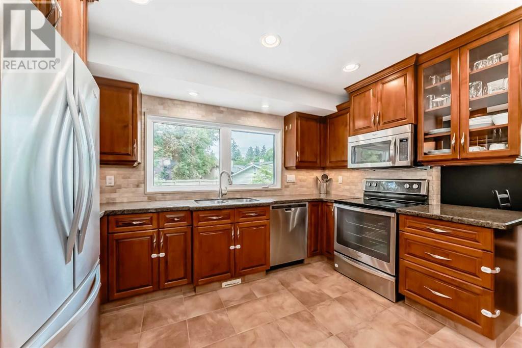 Single Family House 4 Level for Sale in  Cannell Road SW Canyon Meadows Calgary 