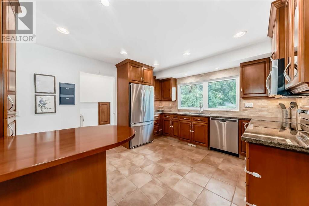 Single Family House 4 Level for Sale in  Cannell Road SW Canyon Meadows Calgary 