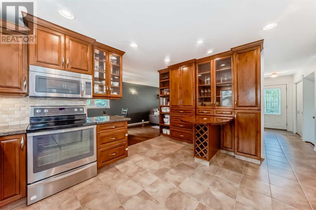 Single Family House 4 Level for Sale in  Cannell Road SW Canyon Meadows Calgary 