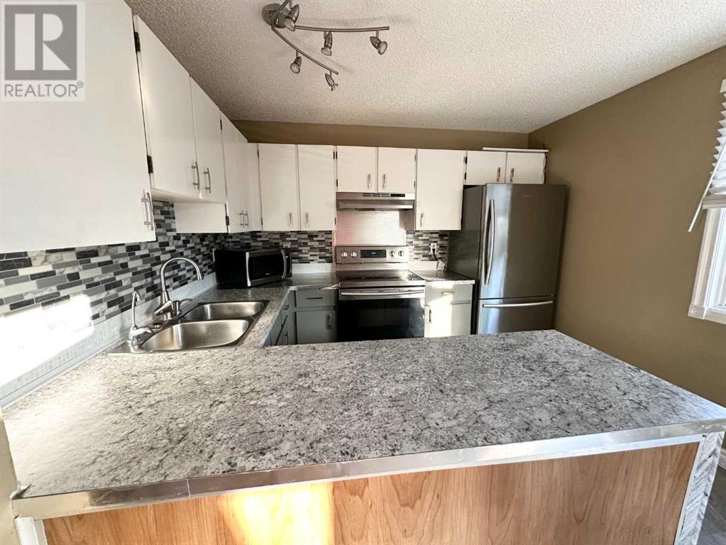 Single Family House for Sale in  Erin Mount Crescent SE Erin Woods Calgary 