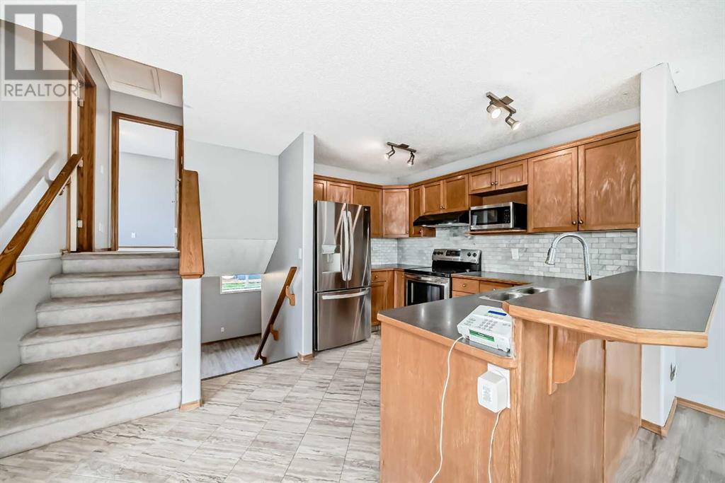 Single Family House 4 Level for Sale in  Taradale Drive NE Taradale Calgary 