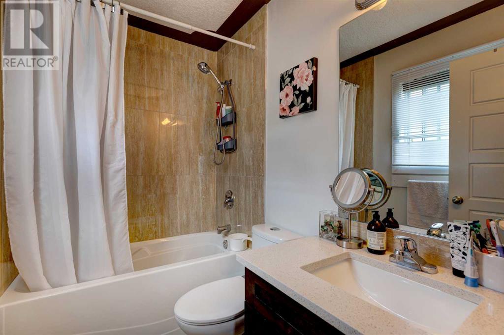 Single Family House for Sale in  Sidon Crescent SW Signal Hill Calgary 