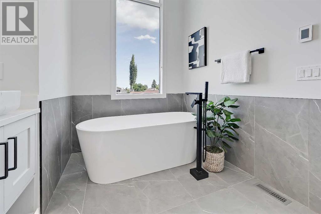 Single Family House for Sale in   Street SW Rosscarrock Calgary 