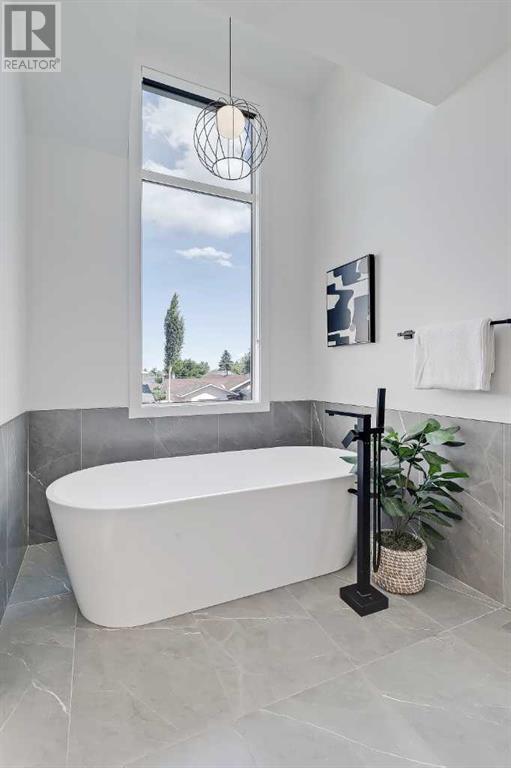 Single Family House for Sale in   Street SW Rosscarrock Calgary 