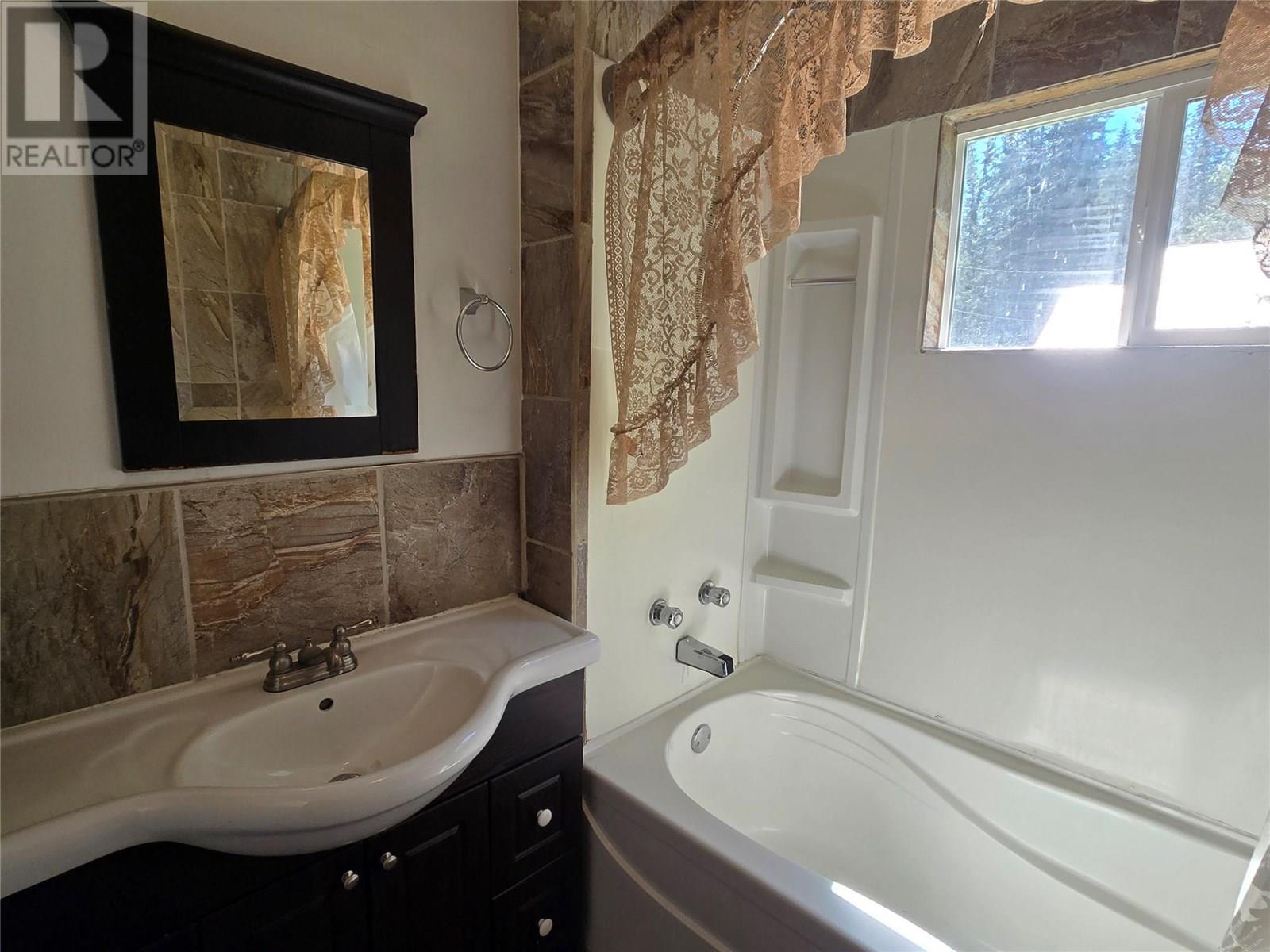 Photo 15 of 303 Fir Street, Ymir BC