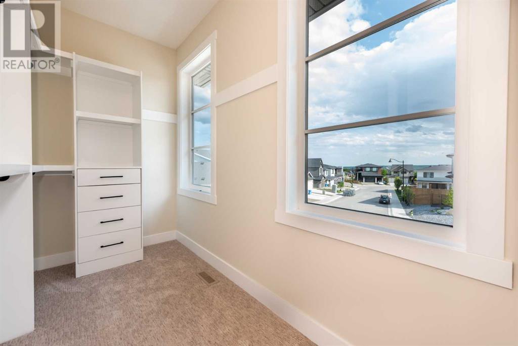 Single Family House for Sale in  Spring Creek Circle SW Springbank Hill Calgary 