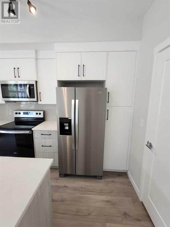 Single Family House for Sale in   Belmont Street SW Belmont Calgary 