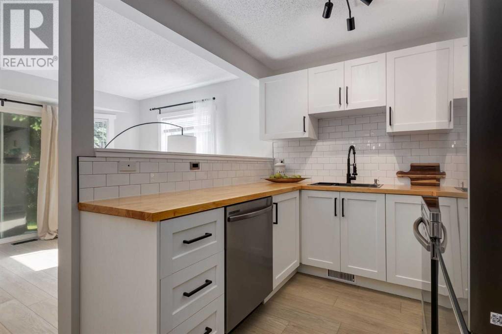 Single Family House for Sale in  Millrise Green SW Millrise Calgary 